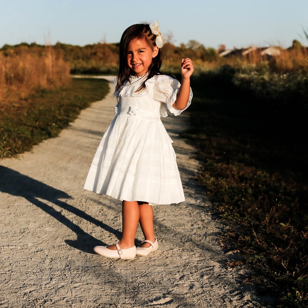 Beautiful white dress by Nora Lee